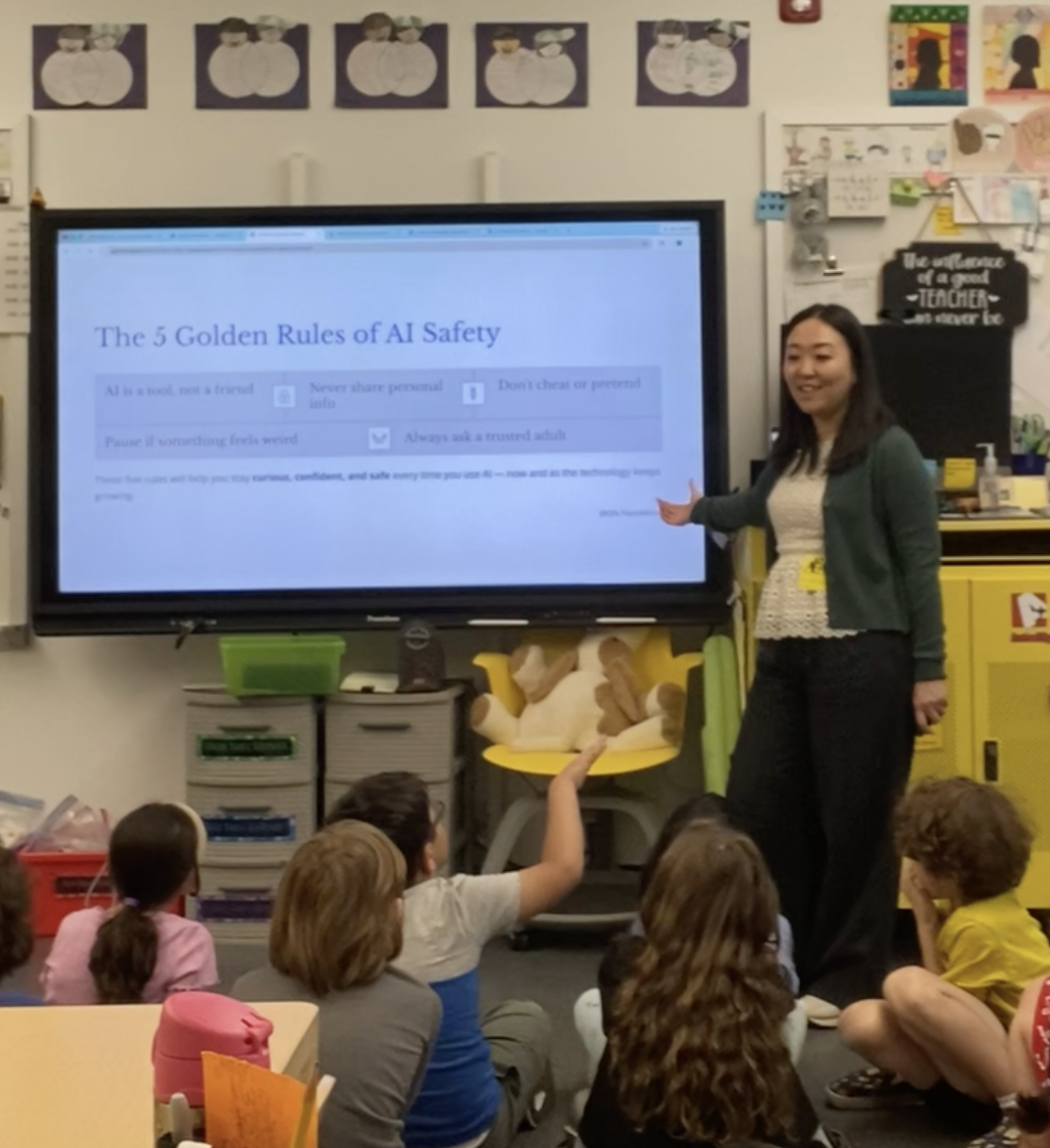 Students reacting with excitement during an AI learning session