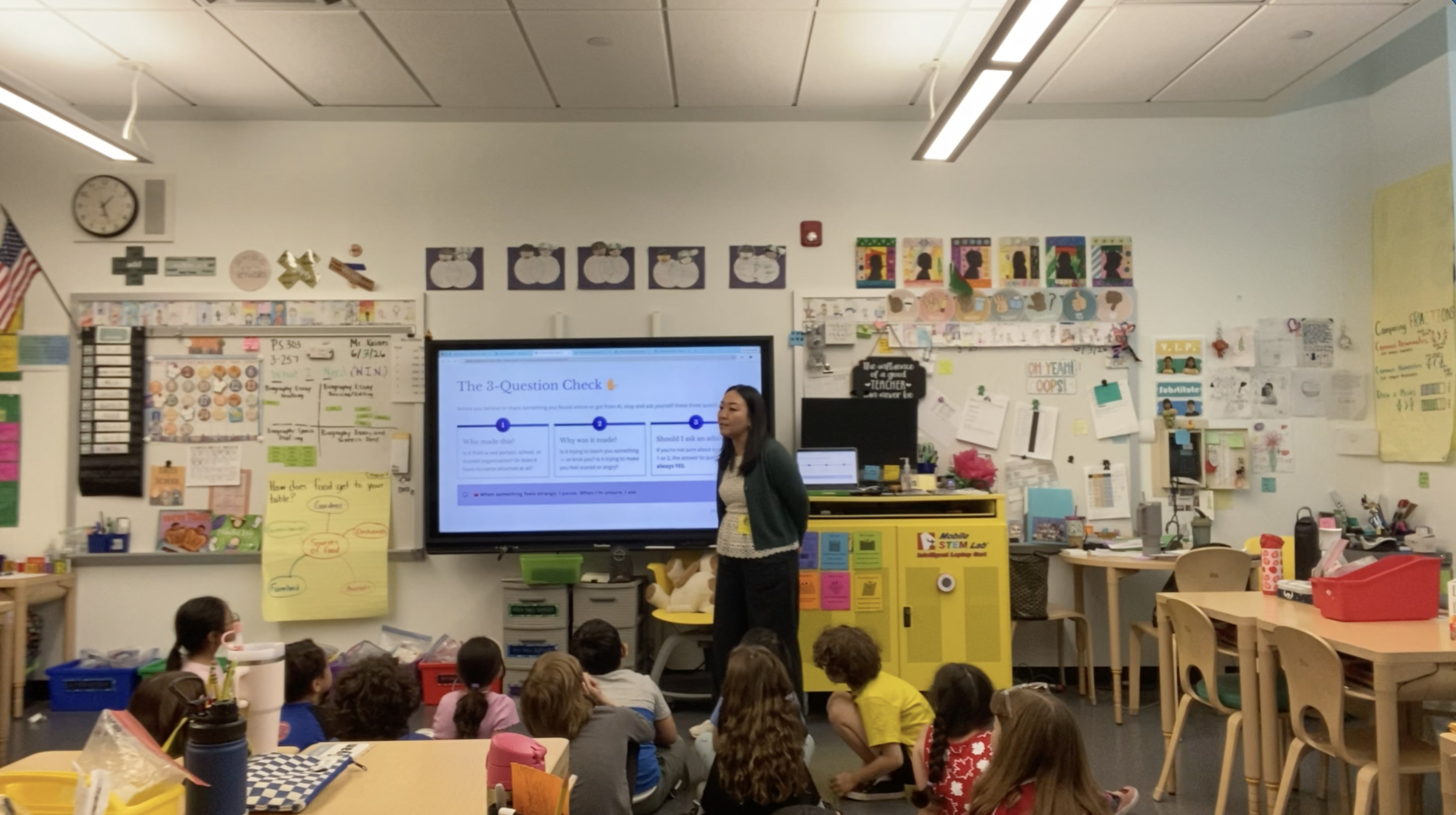A classroom full of engaged students learning about AI best practices